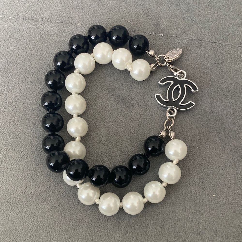 CHANEL Black and White Double Strand Pearl Bracelet with CC Charm